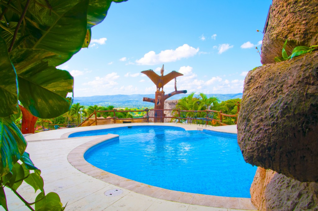 swimming pool at cahal pech village resort