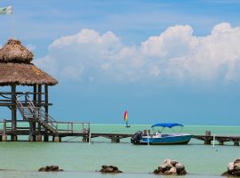 5 Important Things You Should Care About When You Hire a Boat in Belize belize-dock-two-boats-1920