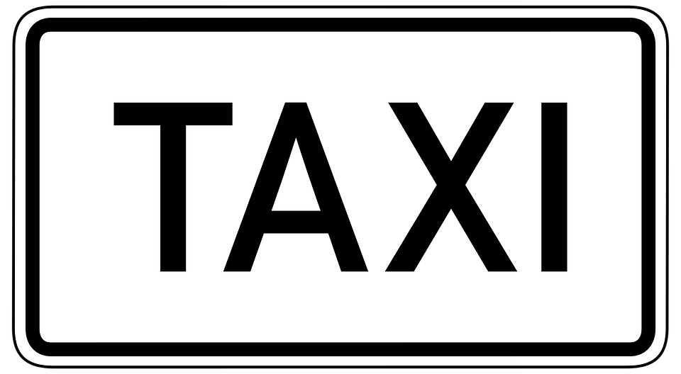how to ride a taxi in belize